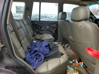 1993 Jeep Grand Wagoneer z VIN 1J4GZ88Y6PC711184, wystawiony jako Copart lot #46785895 z przebiegiem 280 127 mil mil oraz Czysty tytuł • Clean title. Historia ofert i sprzedaży dostępna na DreamBid. Obrazek 11.