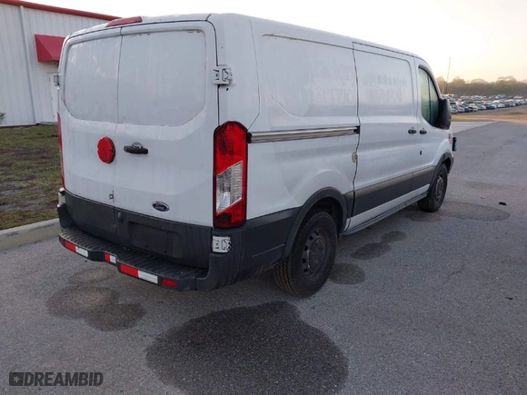 2016 Ford Transit Cargo Van with VIN 1FTYE1YM5GKB08596, listed as a IAAI auction lot 41459496 with 162,128 mi miles. Bid and sale history available at carsss.com. Image 4.