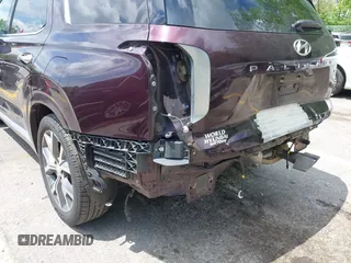 2021 Hyundai Palisade Limited with VIN KM8R5DHE0MU263048, listed as a IAAI auction lot 42365566 with 90,102 mi miles and . Bid and sale history available at DreamBid. Image 6.