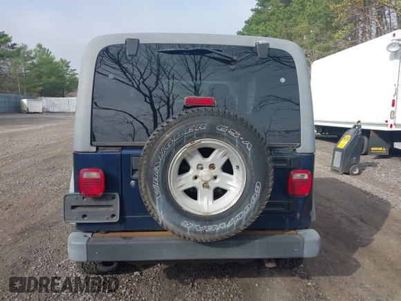 2005 Jeep Wrangler Sport z VIN 1J4FA49S25P302627, wystawiony jako IAAI lot #42100601 z przebiegiem 169 650 mil mil oraz . Historia ofert i sprzedaży dostępna na DreamBid. Obrazek 16.