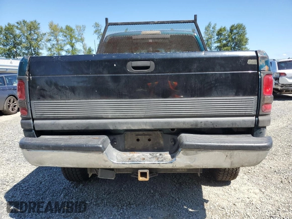 1999 Dodge 2500 with VIN 1B7KF23W2XJ539940, listed as a Copart auction lot 64237595 with 211,718 mi miles and Salvage title. Bid and sale history available at DreamBid. Image 6.