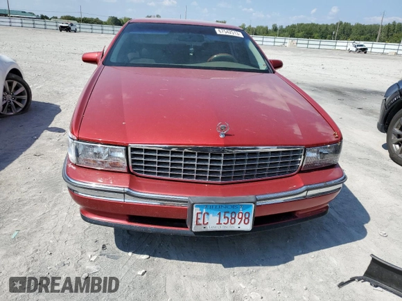 1995 Cadillac DeVille z VIN 1G6KD52B5SU263656, wystawiony jako Copart lot #83631284 z przebiegiem Nie podano mil oraz Szkoda całkowita • Salvage title. Historia ofert i sprzedaży dostępna na DreamBid. Obrazek 5.
