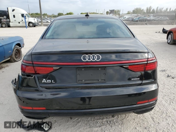 2020 Audi A8 z VIN WAU8EAF84LN004211, wystawiony jako Copart lot #53280765 z przebiegiem 66 930 mil mil oraz Szkoda całkowita • Salvage title. Historia ofert i sprzedaży dostępna na DreamBid. Obrazek 6.