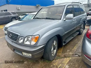 2001 Lexus LX 470 z VIN JTJHT00W313508801, wystawiony jako Copart lot #60938545 z przebiegiem 118 013 mil mil oraz Czysty tytuł • Clean title. Historia ofert i sprzedaży dostępna na DreamBid. Obrazek 2.