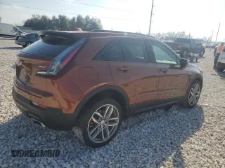 2021 Cadillac XT4 AWD Sport with VIN 1GYFZFR49MF042933, listed as a Copart auction lot 44150315 with 21,926 mi miles and Salvage title. Bid and sale history available at DreamBid. Image 3.