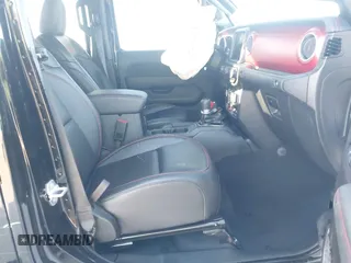 2023 Jeep Gladiator Rubicon z VIN 1C6JJTBGXPL543787, wystawiony jako IAAI lot #40963799 z przebiegiem 5 402 mil mil oraz . Historia ofert i sprzedaży dostępna na DreamBid. Obrazek 5.