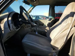 1999 GMC Safari with VIN 1GKEL19W9XB530660, listed as a Copart auction lot 79109684 with 161,240 mi miles and Salvage Title. Bid and sale history available at carsss.com. Image 7.