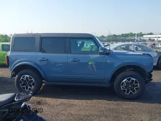 2024 Ford Bronco Outer Banks z VIN 1FMDE8BH3RLB41205, wystawiony jako IAAI lot #42558633 z przebiegiem 1 457 mil mil oraz . Historia ofert i sprzedaży dostępna na DreamBid. Obrazek 13.