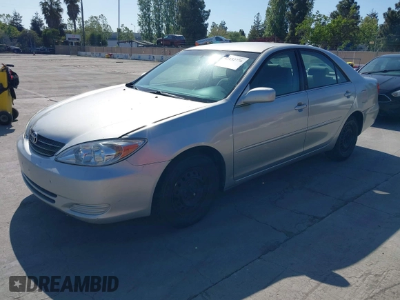 2004 Toyota Camry LE with VIN 4T1BE32K94U832506, listed as a IAAI auction lot 42152776 with 186,627 mi miles and . Bid and sale history available at carsss.com. Image 2.