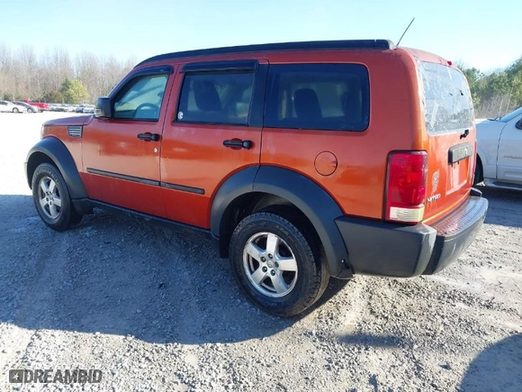 2007 Dodge Nitro SXT with VIN 1D8GT28K67W591158, listed as a IAAI auction lot 41672372 with 218,052 mi miles. Bid and sale history available at carsss.com. Image 3.