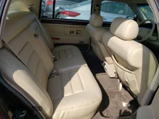 1995 Cadillac Concours z VIN 1G6KF52Y1SU245573, wystawiony jako Copart lot #68715984 z przebiegiem Nie podano mil oraz Szkody całkowita. Historia ofert i sprzedaży dostępna na DreamBid. Obrazek 10.