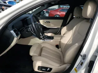 2020 BMW 3 Series 330i with VIN WBA5R1C0XLFH39262, listed as a Copart auction lot 57398585 with 55,456 mi miles and Salvage title. Bid and sale history available at DreamBid. Image 7.