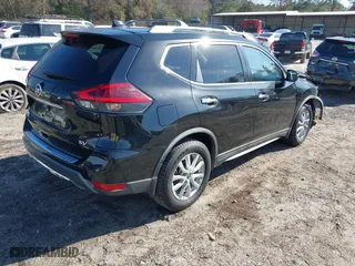 2019 Nissan Rogue SV with VIN KNMAT2MTXKP509941, listed as a IAAI auction lot 41125153 with 105,061 mi miles. Bid and sale history available at carsss.com. Image 4.