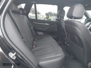 2018 BMW X5 xDrive40e iPerformance with VIN 5UXKT0C54J0V99573, listed as a IAAI auction lot 41490567 with 50,650 mi miles. Bid and sale history available at carsss.com. Image 8.