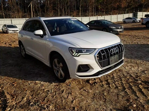 2020 Audi Q3 Premium Plus with VIN WA1BECF39L1010502, listed as a Copart auction lot 85604974 with 59,465 mi miles and Salvage Title. Bid and sale history available at carsss.com. Image 12.