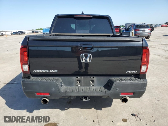 2023 Honda Ridgeline RTL-E with VIN 5FPYK3F72PB001592, listed as a Copart auction lot 52154625 with 41,153 mi miles and Salvage title. Bid and sale history available at DreamBid. Image 6.