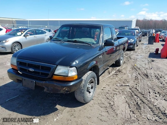 2000 Ford Ranger XL with VIN 1FTYR14C5YTB09793, listed as a IAAI auction lot 41939556 with 124,883 mi miles. Bid and sale history available at carsss.com. Image 2.