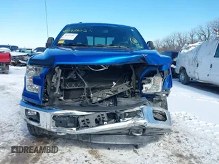 2015 Ford F-150 XLT with VIN 1FTEW1EG1FFA87638, listed as a IAAI auction lot 41597302 with 143,400 mi miles. Bid and sale history available at carsss.com. Image 13.