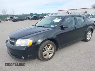 2009 Dodge Avenger SXT with VIN 1B3LC56B49N570157, listed as a IAAI auction lot 41796122 with 164,571 mi miles. Bid and sale history available at carsss.com. Image 2.
