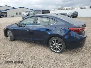 2018 Mazda 3 Grand Touring z VIN 3MZBN1W38JM190398, wystawiony jako Copart lot #53164605 z przebiegiem 74 845 mil mil oraz Szkoda całkowita • Salvage title. Historia ofert i sprzedaży dostępna na DreamBid. Obrazek 2.