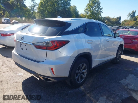 2019 Lexus RX with VIN JTJBZMCA0K2041369, listed as a IAAI auction lot 40557791 with 51,524 mi miles. Bid and sale history available at carsss.com. Image 4.