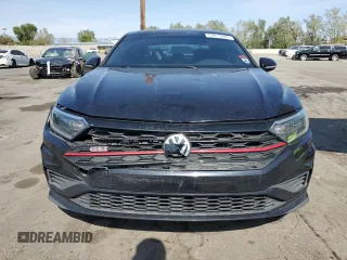 2019 Volkswagen Jetta GLI S with VIN 3VW5T7BU9KM143452, listed as a Copart auction lot 52015965 with 115,652 mi miles and Salvage title. Bid and sale history available at DreamBid. Image 5.