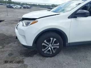 2016 Toyota RAV4 LE with VIN JTMZFREV2GJ096782, listed as a IAAI auction lot 41945319 with 76,866 mi miles. Bid and sale history available at carsss.com. Image 6.