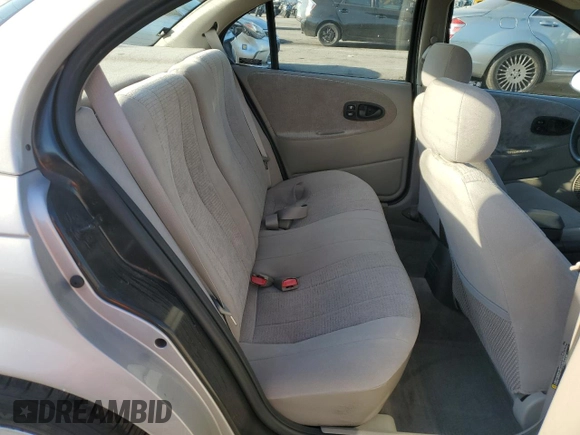 1999 Saturn SL with VIN 1G8ZK5274XZ367394, listed as a Copart auction lot 63863795 with 73,197 mi miles and Salvage title. Bid and sale history available at DreamBid. Image 10.