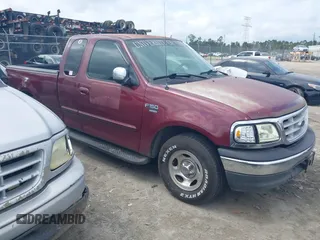 1999 Ford F-150 with VIN 1FTRX17W2XNB98256, listed as a IAAI auction lot 41931497 with Not Provided miles and . Bid and sale history available at DreamBid. Image 1.