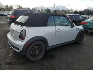 2013 MINI Convertible S with VIN WMWZP3C55DT297215, listed as a Copart auction lot 87995095 with Not provided miles and Salvage title. Bid and sale history available at DreamBid. Image 3.