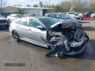 2019 Honda Civic EX-L z VIN 19XFC1F7XKE010279, wystawiony jako IAAI lot #41904593 z przebiegiem 58 319 mil mil oraz . Historia ofert i sprzedaży dostępna na DreamBid. Obrazek 1.