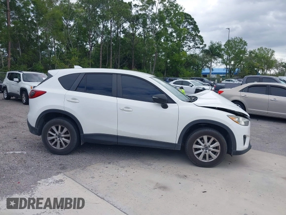 2015 Mazda CX-5 Touring with VIN JM3KE2CY8F0545967, listed as a IAAI auction lot 41909920 with 101,781 mi miles. Bid and sale history available at carsss.com. Image 13.