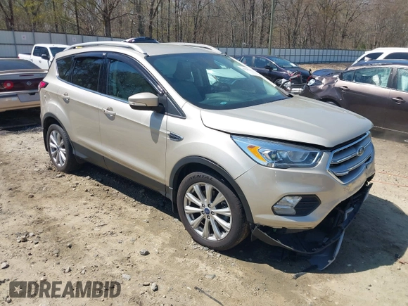 2017 Ford Escape Titanium with VIN 1FMCU9JD3HUC90273, listed as a IAAI auction lot 41828236 with 71,351 mi miles. Bid and sale history available at carsss.com. Image 1.