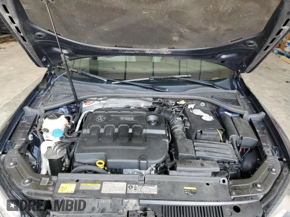 2015 Volkswagen Passat SEL Premium z VIN 1VWCV7A38FC051248, wystawiony jako Copart lot #57019325 z przebiegiem 170 012 mil mil oraz Nie do naprawy • Non repairable. Historia ofert i sprzedaży dostępna na DreamBid. Obrazek 11.