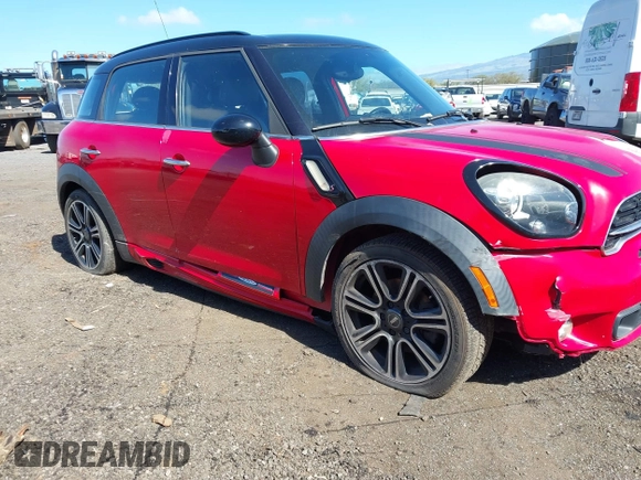2015 MINI Countryman S with VIN WMWZC3C52FWT05204, listed as a IAAI auction lot 41492775 with 80,785 mi miles and . Bid and sale history available at DreamBid. Image 12.