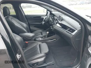 2018 BMW X2 xDrive28i with VIN WBXYJ5C34JEF72637, listed as a IAAI auction lot 42064330 with 96,725 mi miles. Bid and sale history available at carsss.com. Image 5.