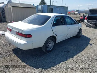 1999 Toyota Camry LE z VIN 4T1BG22K0XU862535, wystawiony jako IAAI lot #42116856 z przebiegiem 186 094 mil mil oraz . Historia ofert i sprzedaży dostępna na DreamBid. Obrazek 4.