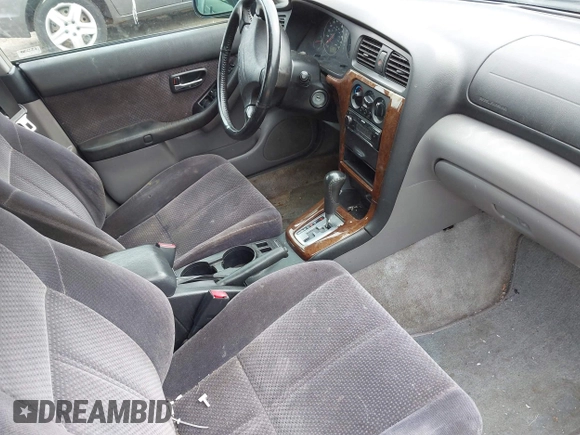 2003 Subaru Legacy L z VIN 4S3BH635037308518, wystawiony jako IAAI lot #42373801 z przebiegiem 129 242 mil mil oraz . Historia ofert i sprzedaży dostępna na DreamBid. Obrazek 5.