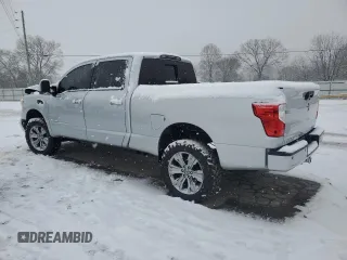 2016 Nissan Titan XD PRO-4X with VIN 1N6BA1F49GN511951, listed as a Copart auction lot 87577645 with 116,076 mi miles and Salvage Title. Bid and sale history available at carsss.com. Image 2.