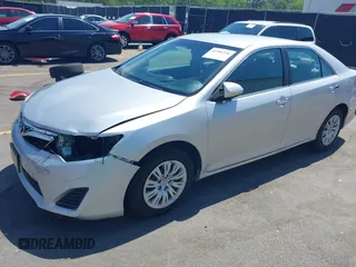 2012 Toyota Camry L with VIN 4T1BF1FK3CU022699, listed as a IAAI auction lot 41986356 with 129,926 mi miles. Bid and sale history available at carsss.com. Image 2.