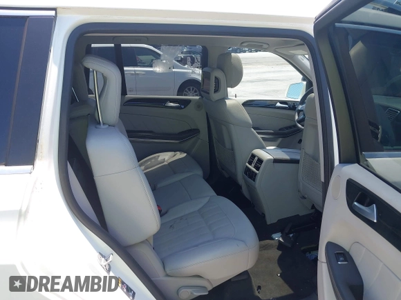 2014 Mercedes-Benz GL 450 with VIN 4JGDF7CE4EA348588, listed as a IAAI auction lot 42601136 with 129,166 mi miles and . Bid and sale history available at DreamBid. Image 8.