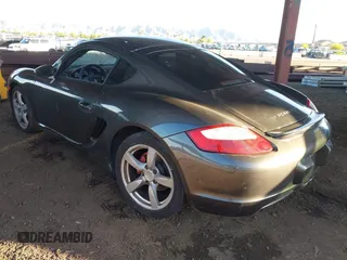 2007 Porsche Cayman S с VIN WP0AB29897U781381, выставлен на аукционе IAAI как лот 42115018 с пробегом Не указан миль и . История ставок и продаж доступна на DreamBid. Изображение 3.