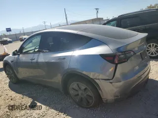2024 Tesla Model Y Long Range with VIN 7SAYGDEE6RA321064, listed as a Copart auction lot 58889795 with 48,857 mi miles and Salvage title. Bid and sale history available at DreamBid. Image 2.