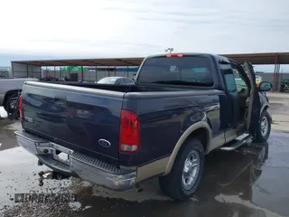 2000 Ford F-150 XL with VIN 1FTRX17L2YNB85627, listed as a IAAI auction lot 41377814 with 123,740 mi miles. Bid and sale history available at carsss.com. Image 4.