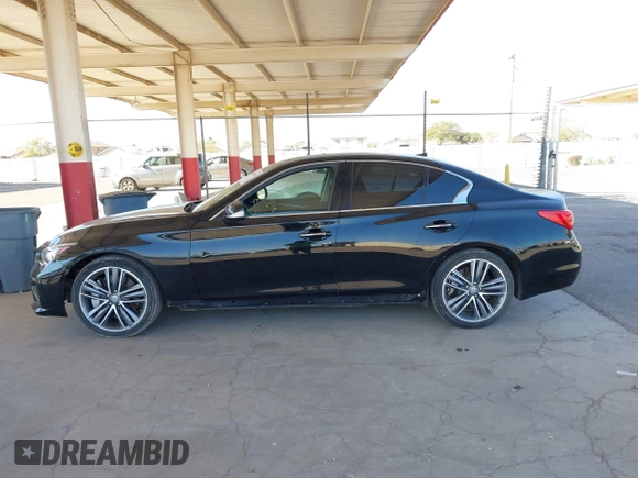 2014 Infiniti Q50 Premium with VIN JN1BV7AP9EM688811, listed as a IAAI auction lot 41483058 with 95,204 mi miles and . Bid and sale history available at DreamBid. Image 14.