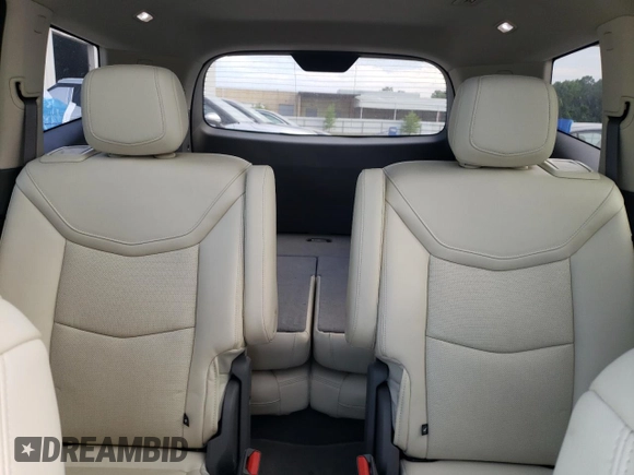 2023 Cadillac XT6 FWD Premium Luxury with VIN 1GYKPCRS5PZ120161, listed as a Copart auction lot 54614235 with 39,700 mi miles and Salvage title. Bid and sale history available at DreamBid. Image 10.