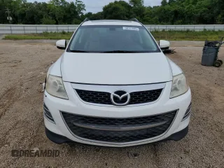 2012 Mazda CX-9 Grand Touring z VIN JM3TB2DA7C0358374, wystawiony jako Copart lot #58741885 z przebiegiem 127 162 mil mil oraz Czysty tytuł • Clean title. Historia ofert i sprzedaży dostępna na DreamBid. Obrazek 5.