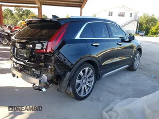 2020 Cadillac XT4 FWD Premium Luxury with VIN 1GYFZCR42LF144359, listed as a IAAI auction lot 42012677 with 34,490 mi miles and . Bid and sale history available at carsss.com. Image 4.