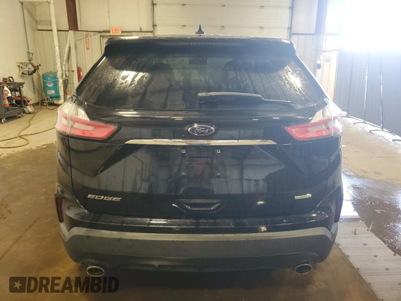 2019 Ford Edge SE z VIN 2FMPK3G96KBC16351, wystawiony jako Copart lot #54377535 z przebiegiem 91 020 mil mil oraz Czysty tytuł • Clean title. Historia ofert i sprzedaży dostępna na DreamBid. Obrazek 6.