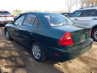2000 Mitsubishi Mirage DE z VIN JA3AY26C2YU026564, wystawiony jako IAAI lot #42139336 z przebiegiem 53 947 mil mil oraz . Historia ofert i sprzedaży dostępna na DreamBid. Obrazek 3.